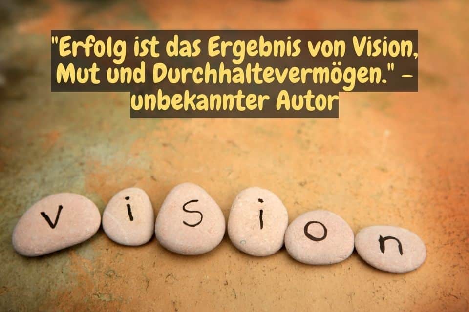 Auf Steine geschrieben VISION und Zitat: "Erfolg ist das Ergebnis von Vision, Mut und Durchhaltevermögen." - unbekannter Autor