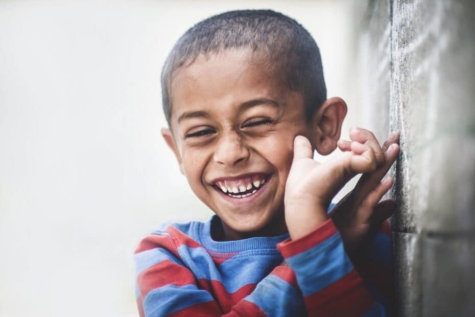 little boy smiling - How do you brighten your day in less than a minute?